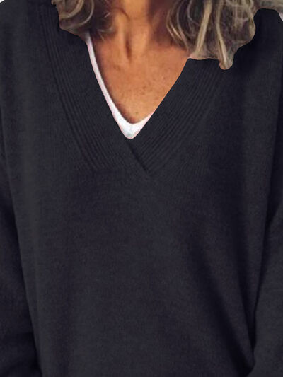Dámský elegantní oversized svetr s výstřihem do V
