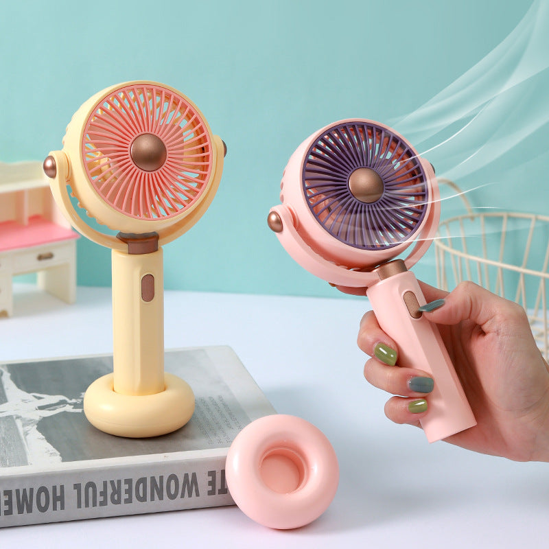 Dámský přenosný ruční ventilátor s ergonomickým designem