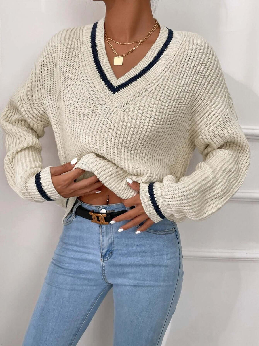 Dámský pruhovaný svetr s výstřihem do V ve volném střihu