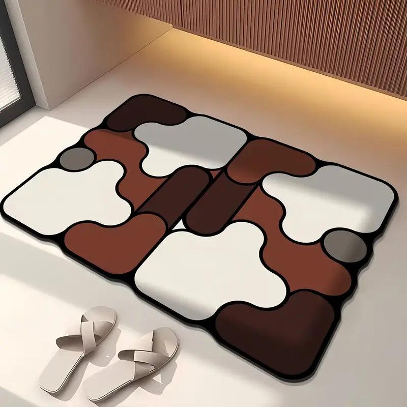 Kreativní protiskluzová koupelnová předložka z křemeliny s motivem puzzle