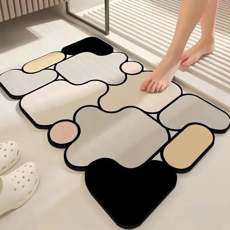 Kreativní protiskluzová koupelnová předložka z křemeliny s motivem puzzle