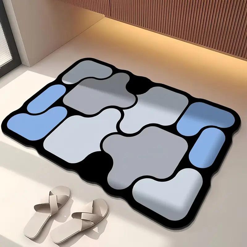 Kreativní protiskluzová koupelnová předložka z křemeliny s motivem puzzle