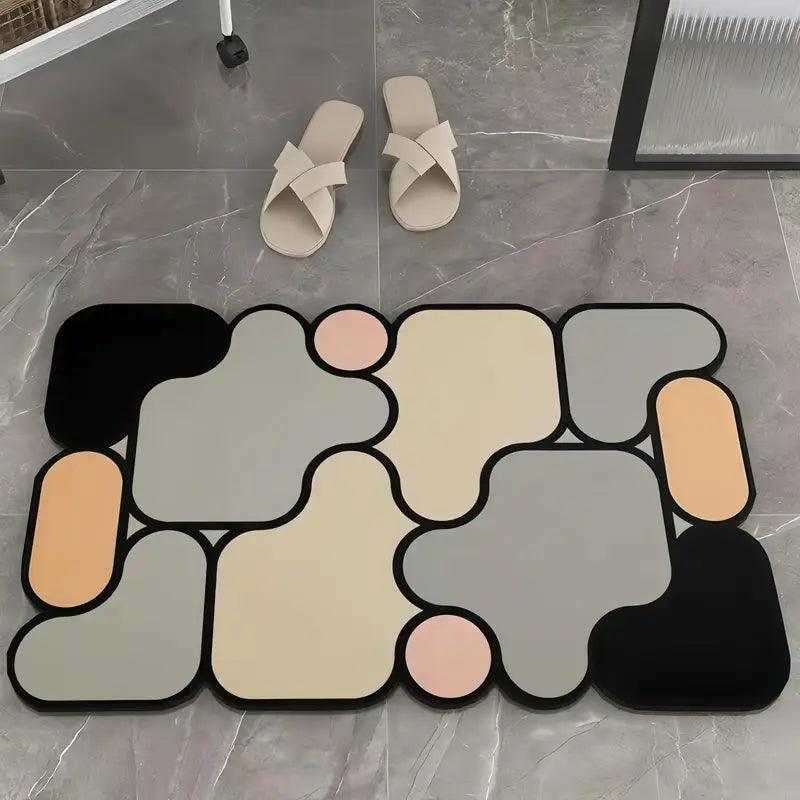 Kreativní protiskluzová koupelnová předložka z křemeliny s motivem puzzle