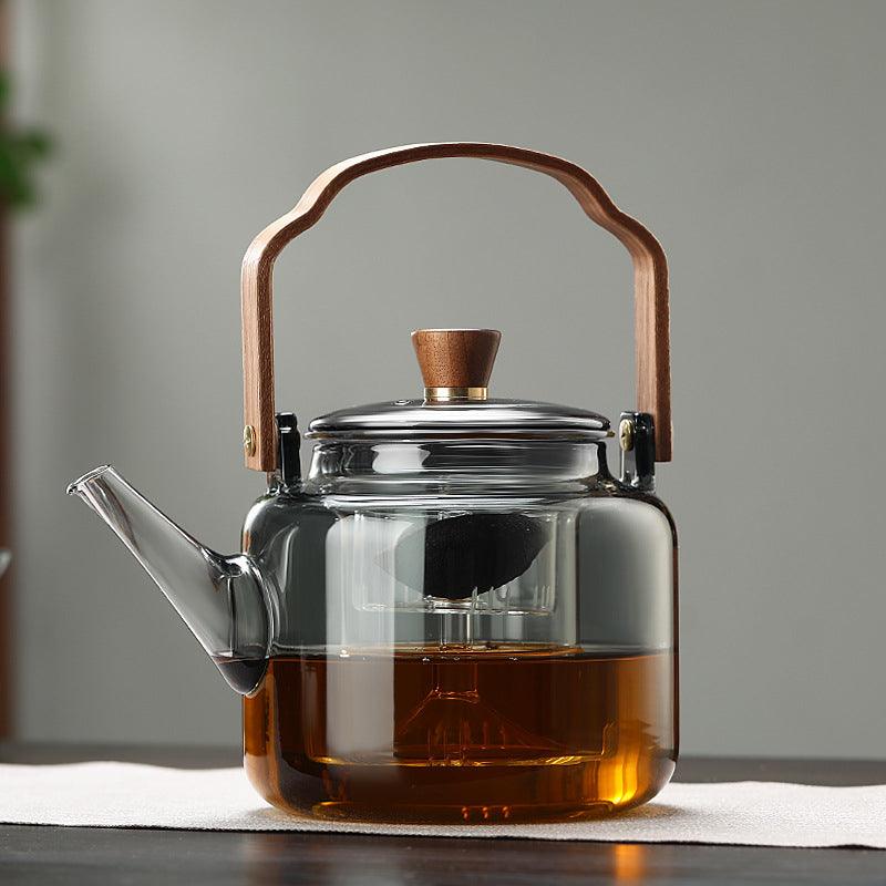 Skleněná čajová konvice s dřevěným víčkem a filtrem – 1,2 l, kouřové sklo a dřevo pro elegantní podávání čaje