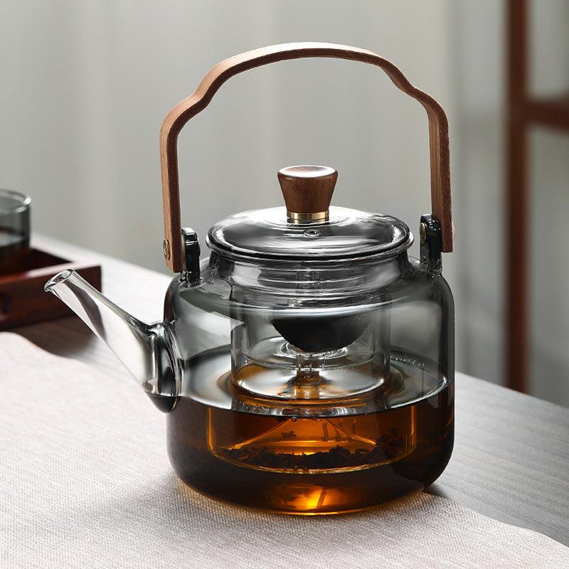 Skleněná čajová konvice s dřevěným víčkem a filtrem – 1,2 l, kouřové sklo a dřevo pro elegantní podávání čaje